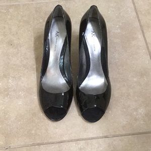 Peekaboo toe black high heels